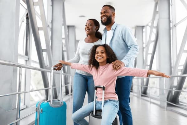 Happy family travelling together